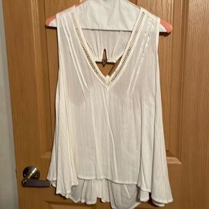 An M rayon flowy, cream w/ gold stripes, razor back, high/low tank top, Size L
